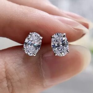 New Classic Oval Gold tone Stud Earrings with stainless steel posts.